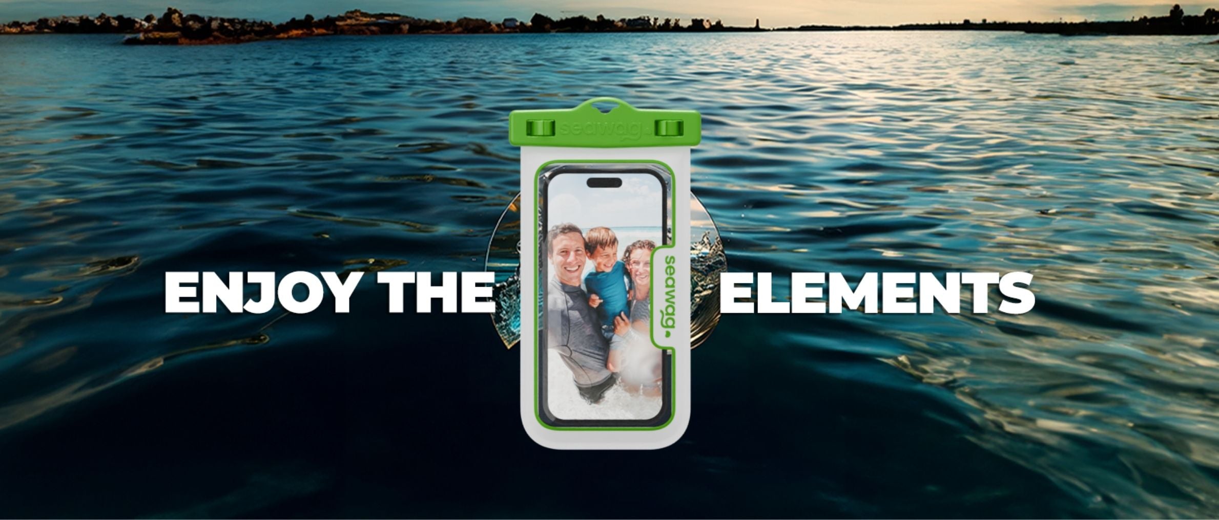 Phone case with a photo of a family on a beach, water background with 'Enjoy the Elements' text.